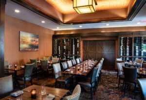 Private dining room table set for a holiday gathering at the Craftsman Wood Grille & Tap House